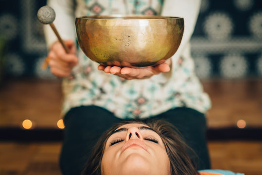 Sound bath with a singing bowl